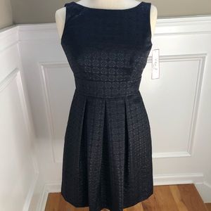 Black pleated cocktail dress